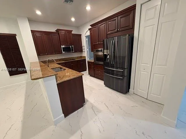 8711 NW 41st St — Photo 9