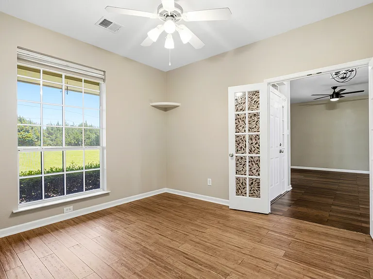 Secondary bedroom at front of home could be used as an office