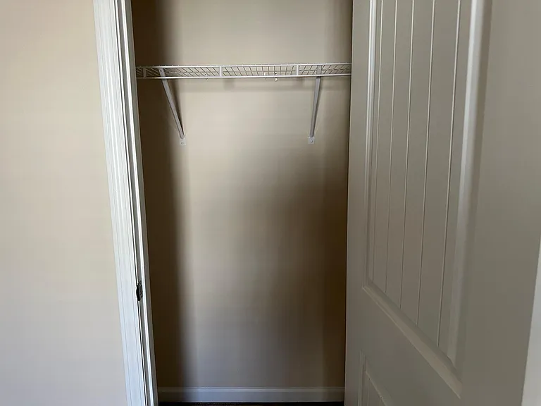 A front view of the closet in room 1.