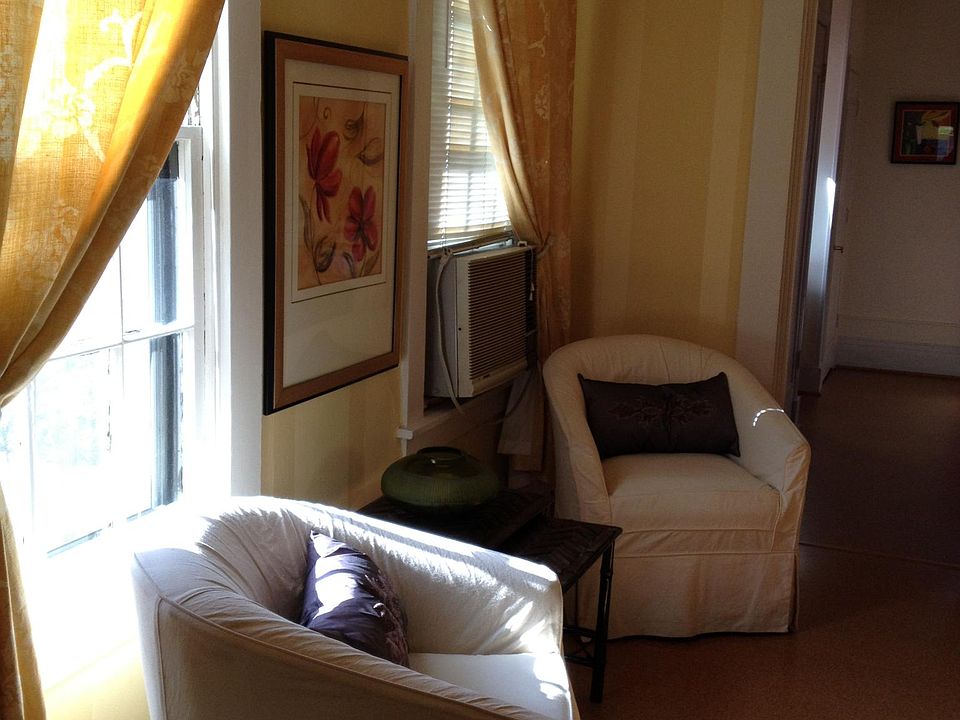 Living room has 4 big windows. Full of light