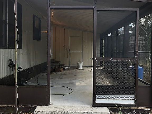 Enclosed patio and shed