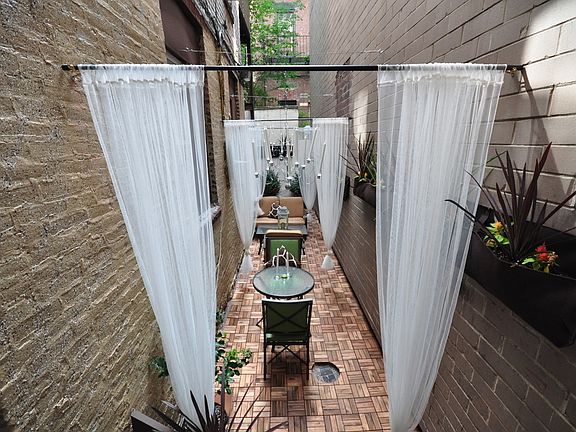 5th image of 212 E 12th St APT 1B