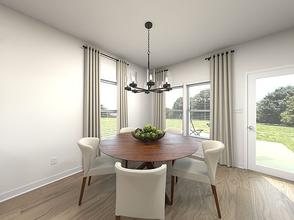 The open-concept floorplan allows for an easy flow between the kitchen and dining areas.