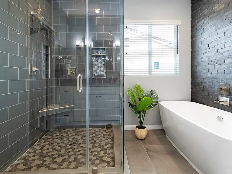Shower and stand-alone tub.