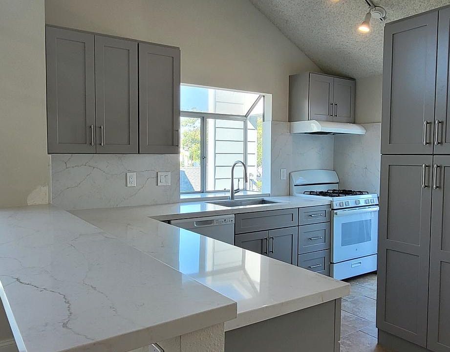 Quartz breakfast bar with extra outlets for charging or laptops!