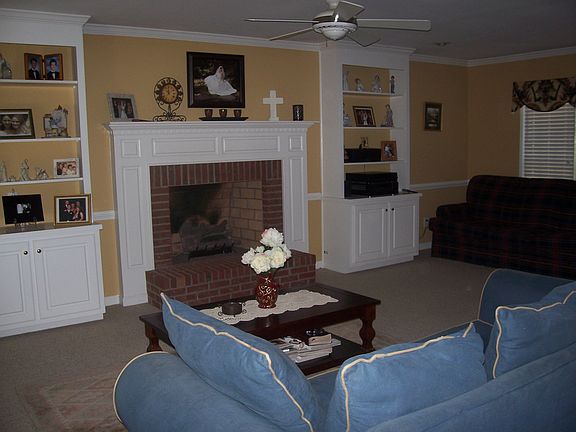 Family room with gas log fireplace. 17'x25'
