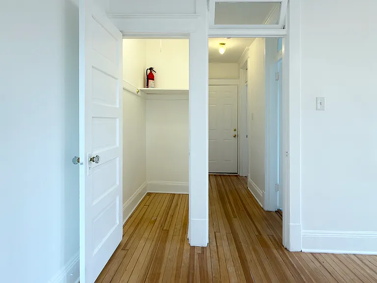Living room closet, hall to bathroom, exit and master bedroom