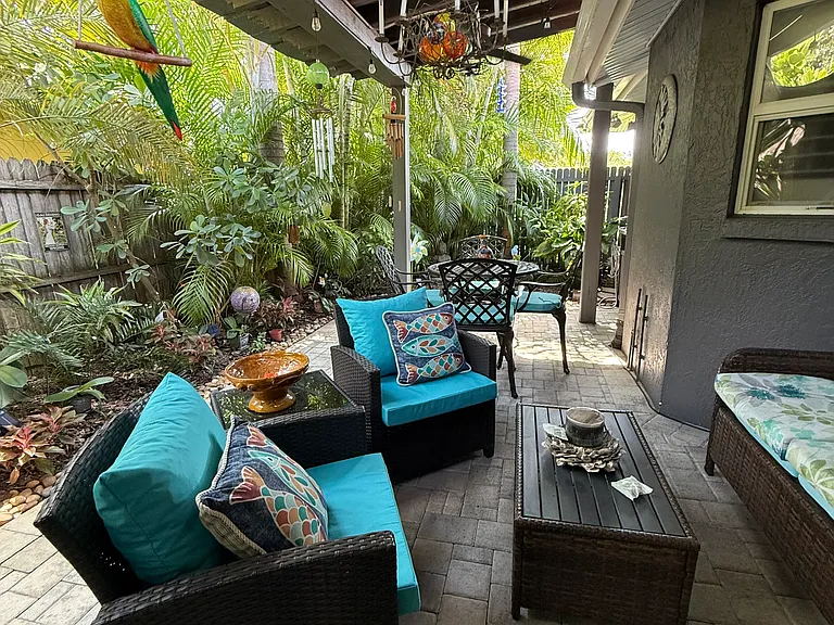 Tropical Back patio with wonderful afternoon shade & breeze