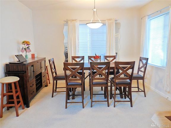 Formal Dining room open to the living room with easy access to the kitchen.