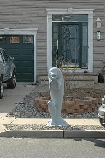 Front of house w/custom dolphin mailbox