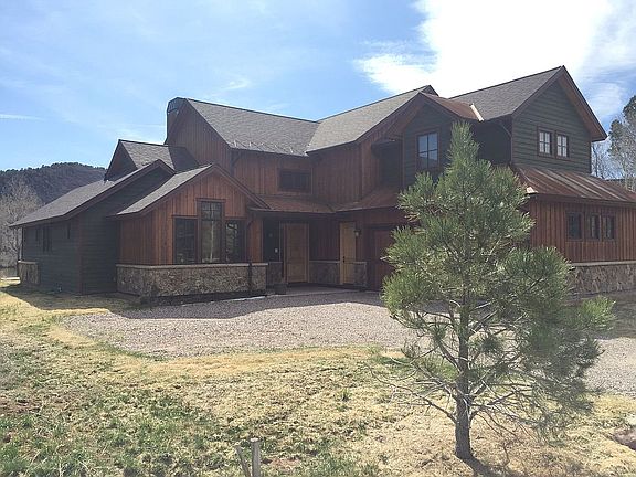 Corner of Lot View of House