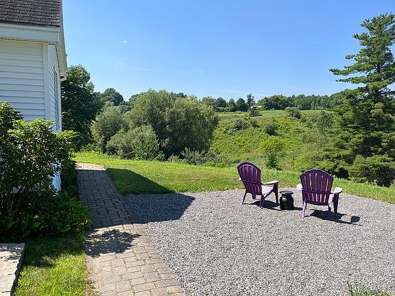 Side of house with seating area