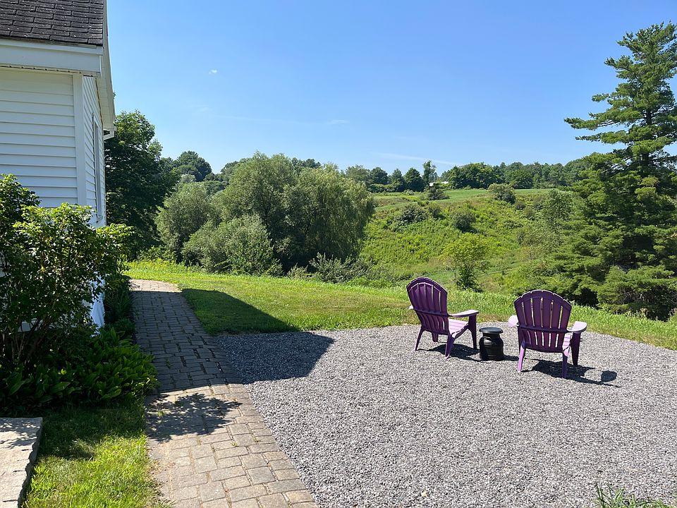 Side of house with seating area