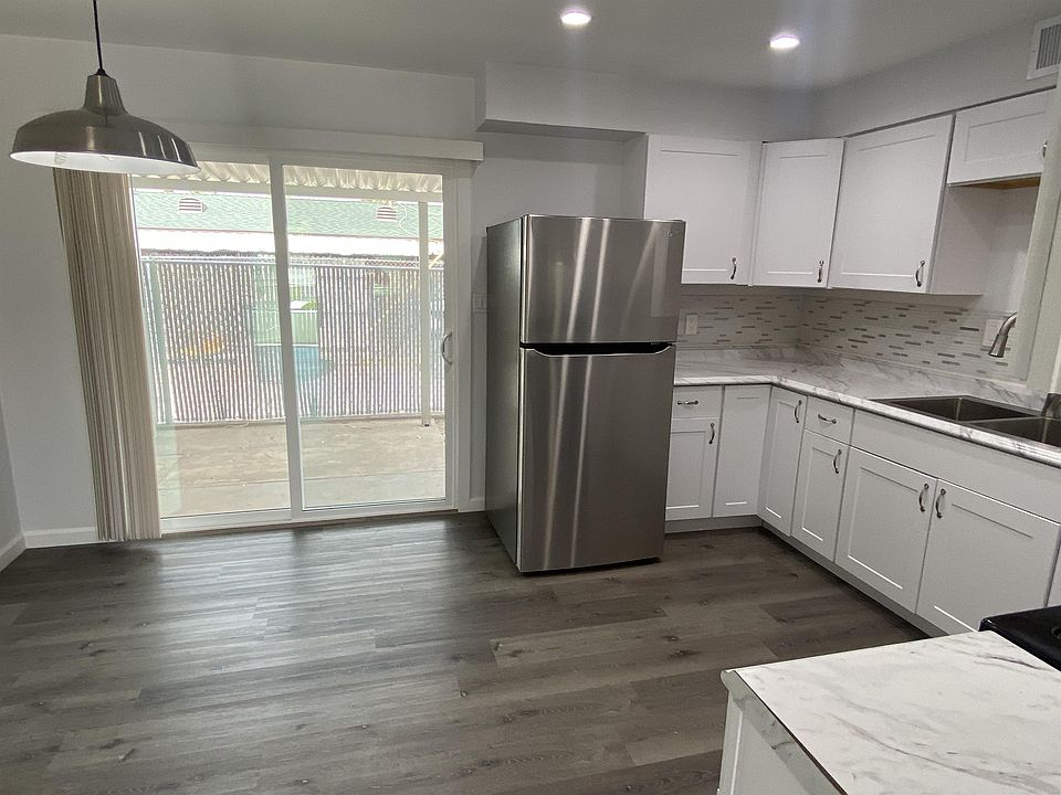 Sliding Glass Door Leading to Private Backyard