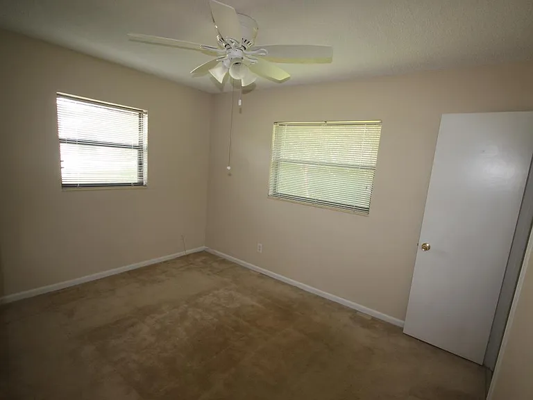 Master bedroom w/ 1/2 bath. LVT tile now not carpet.