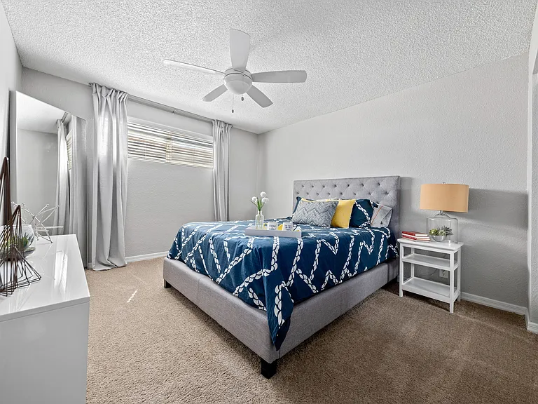 Carpeted Bedroom w/ Ceiling Fan