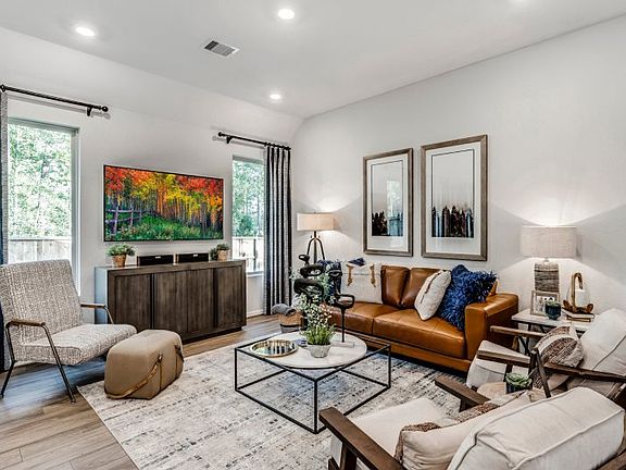 The family room features an open concept layout with plenty of space for a comfortable couch and oth