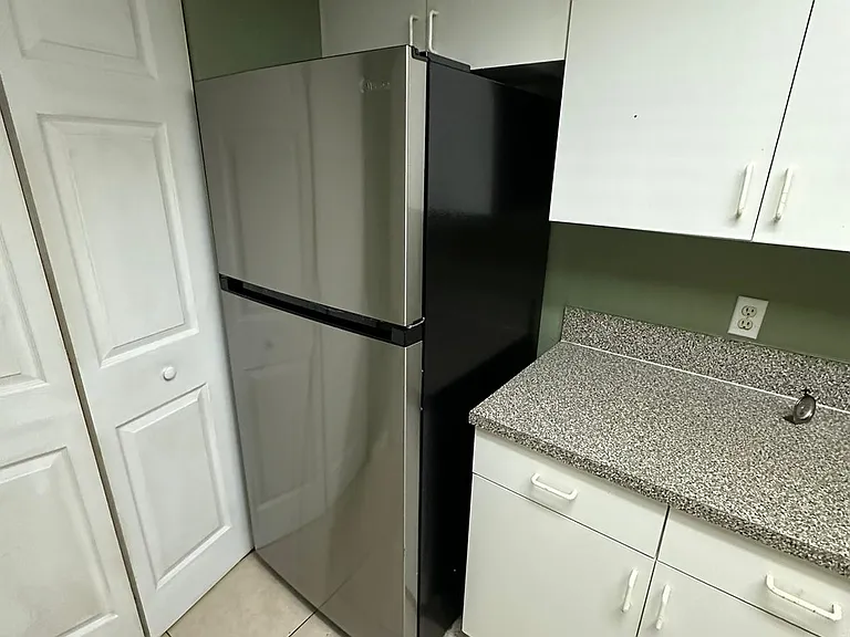 5005 Wiles Rd #102 — Photo 34