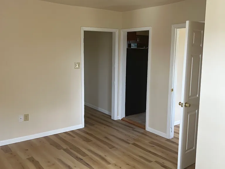 Taken from the living room. Flooring is vinyl plank