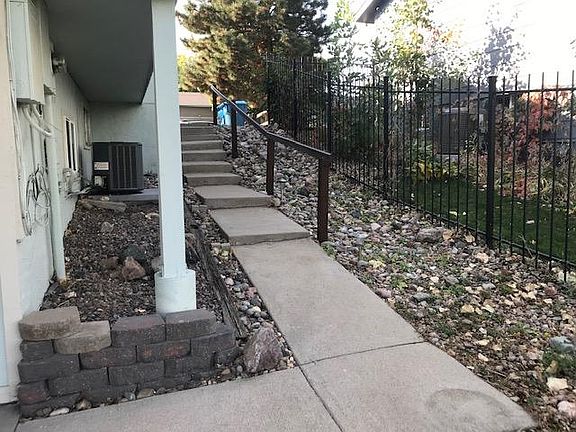 Side stairs from assigned parking space