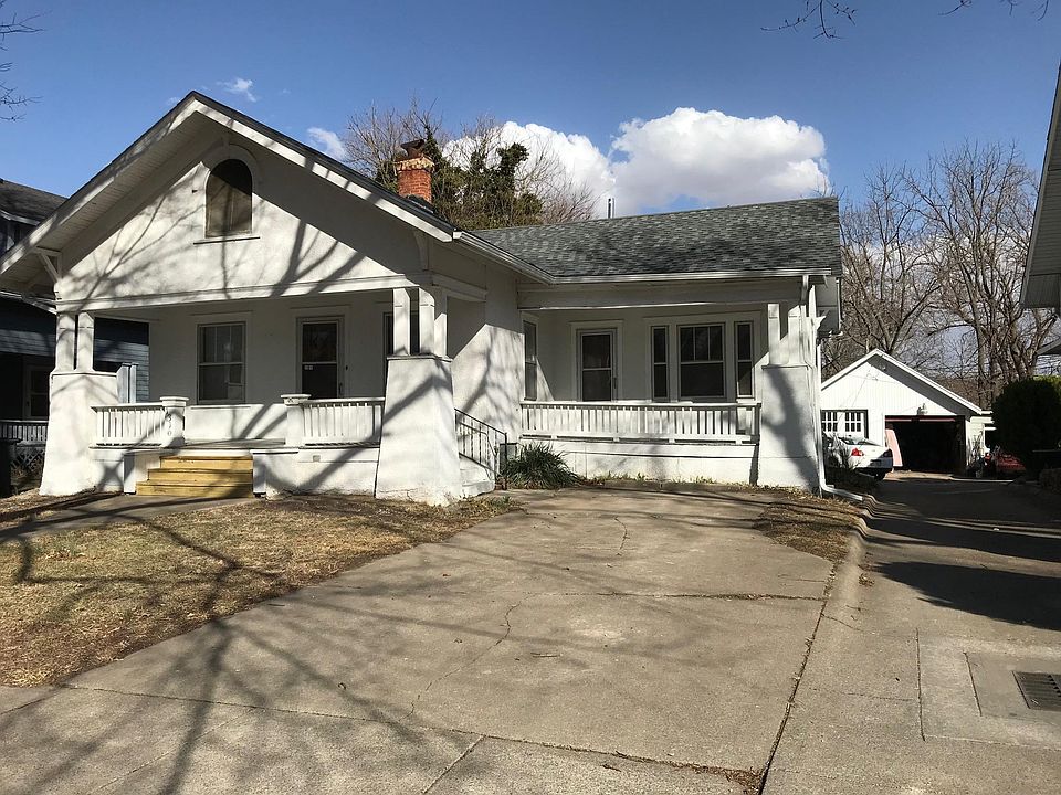 Front - two front porches, off-street parking in front and back