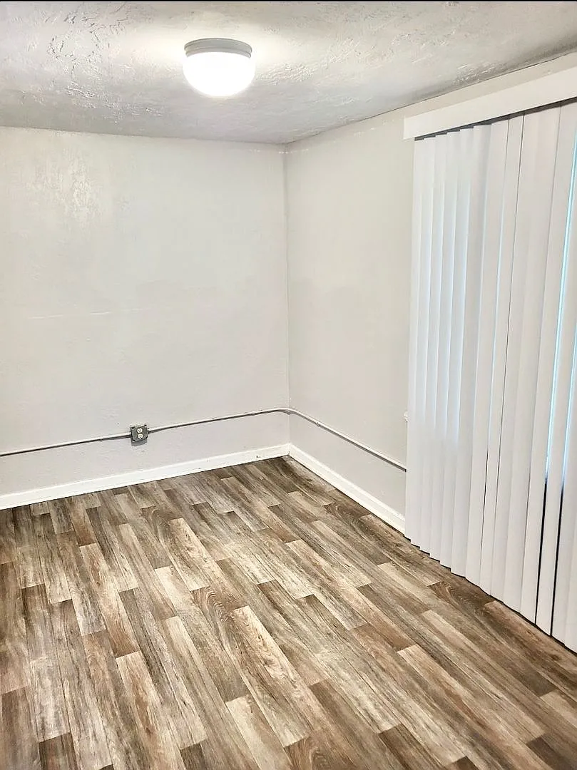 Freshly Updated Brick Ranch with Room to Relax — Photo 4