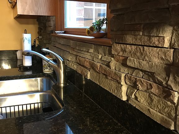 ROCK WALL FACING THROUGHOUT