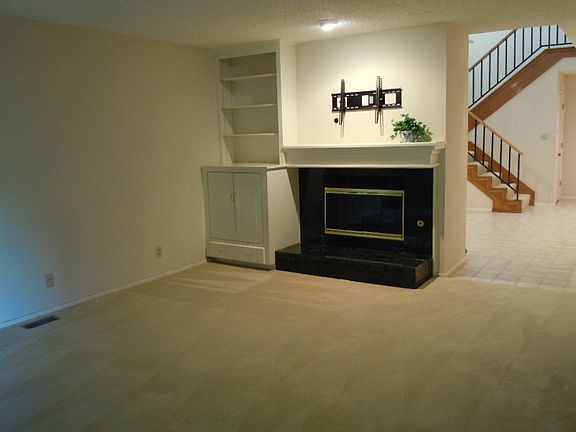 Formal Living with fireplace & built-in