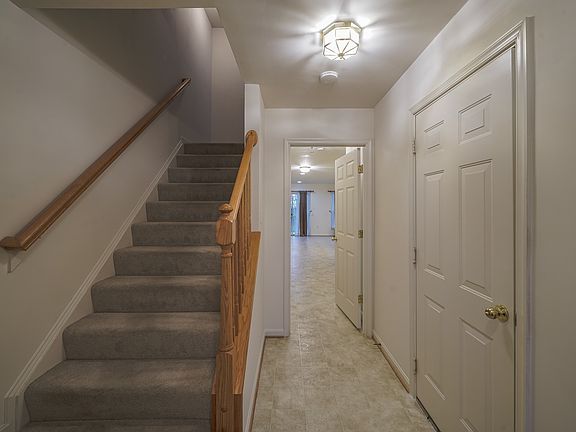 stairs-ground floor bedroom/rec room-garage door