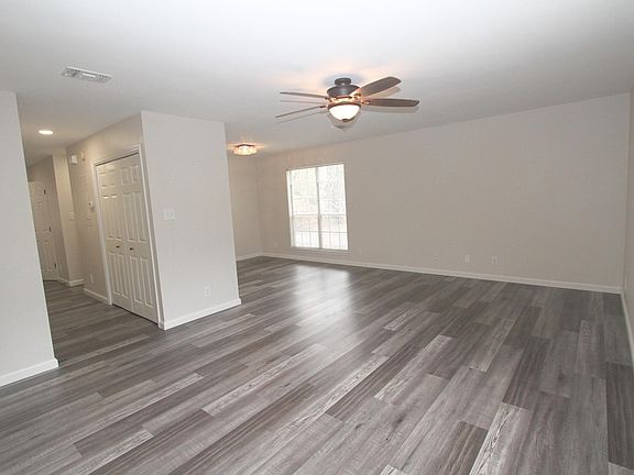 Freshly scraped & painting ceiling with all new ceiling fans and led light fixtures.
