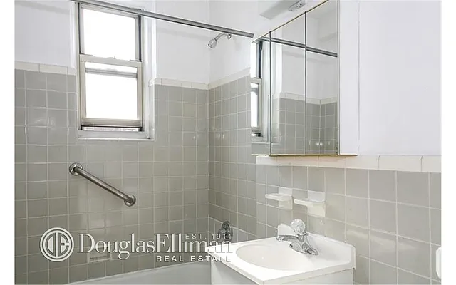 Sold by Douglas Elliman | media 11