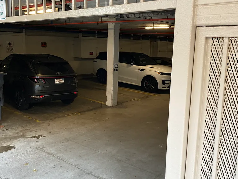 Two side-by-side parking spaces, about 40 yard to your front door with no stairs (three steps).