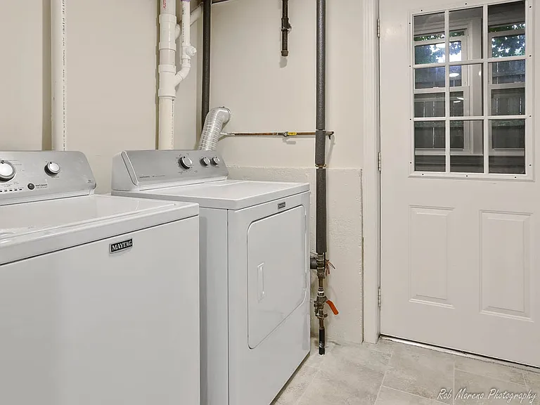 Laundry Area and right side entrance for lower unit.