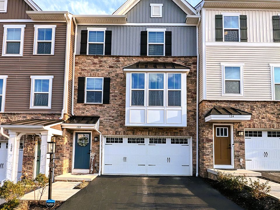 Front View with Garage & Driveway