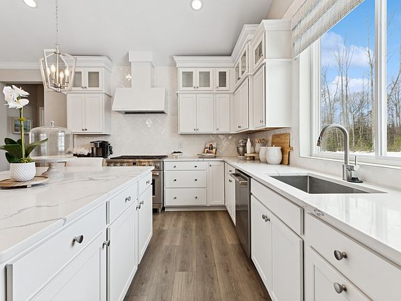 Kitchen with pendant lights over island