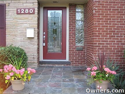 New leaded glass door and slate porch