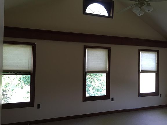 Large Master Bedroom with cathedral ceiling.
