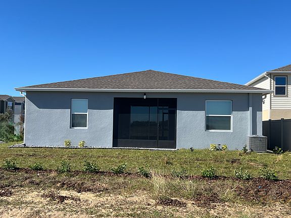Back of house- Covered and screened lanai