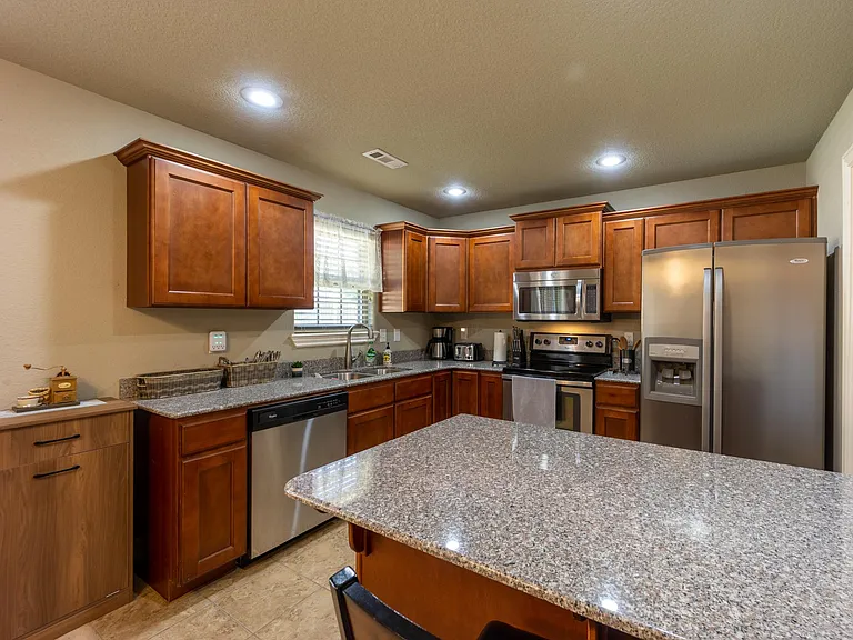 Kitchen with all granite counters