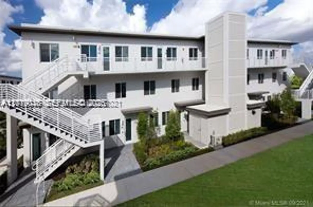 Building Photo - 6450 NW 102nd Path #107