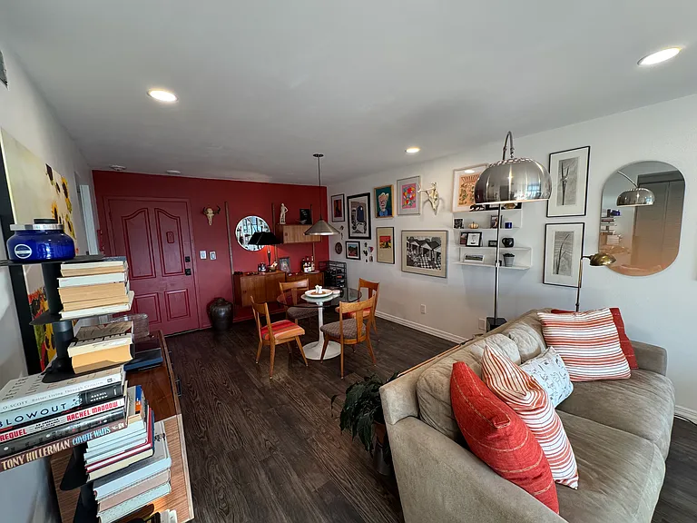 Past furnished living room photos for scale.