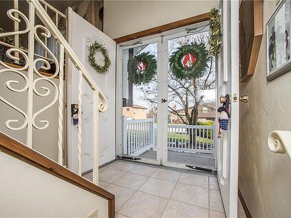 Gorgeous double doors allow natural light to flow throughout the home.