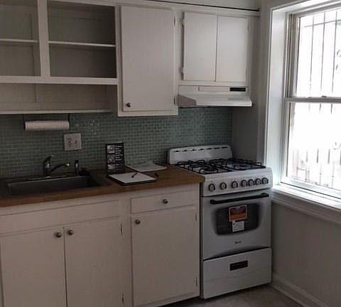 Recent appliance upgrade and kitchen refurbished with exterior exhaust and Pella windows through out