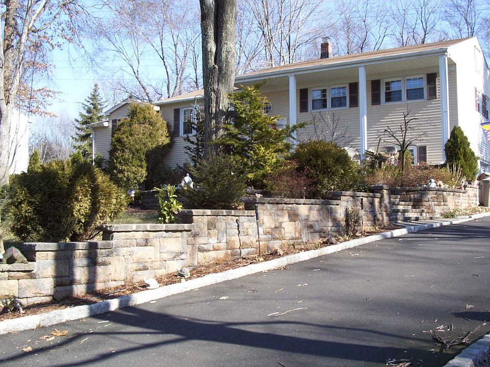 New driveway and natural stone landscaping