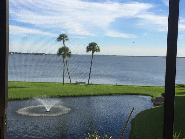 Beautiful water view from patio! Water Spray in pond. Watch boats and dolphins go by!