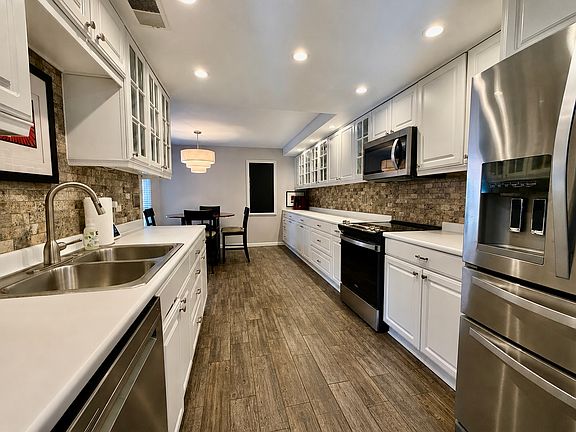 Fully equipped kitchen service for 12+, all new appliances, ceramic tile floor, lots of cabinetry