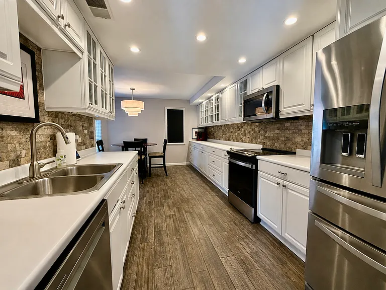 Fully equipped kitchen service for 12+, all new appliances, ceramic tile floor, lots of cabinetry