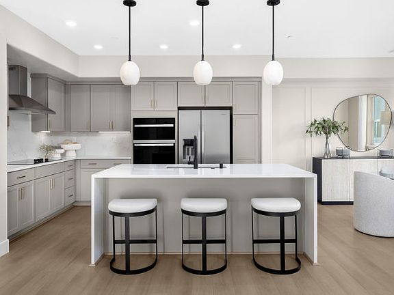 Kitchen with chef s appliance package and large central island