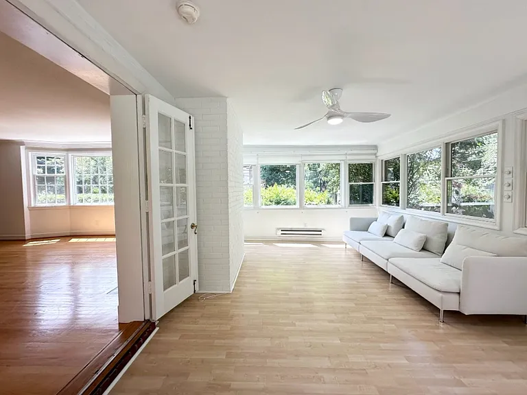 Sunroom Connected to Living Room and Patio
