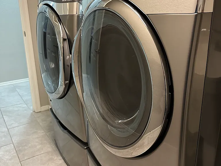 Full size front loading washer and dryer included in rental.